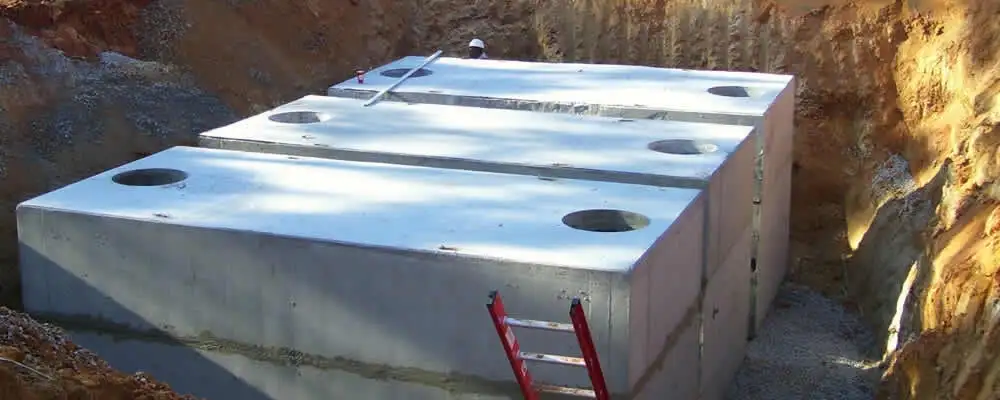 Septic tank installation site with a newly placed concrete tank in Berkeley, CA